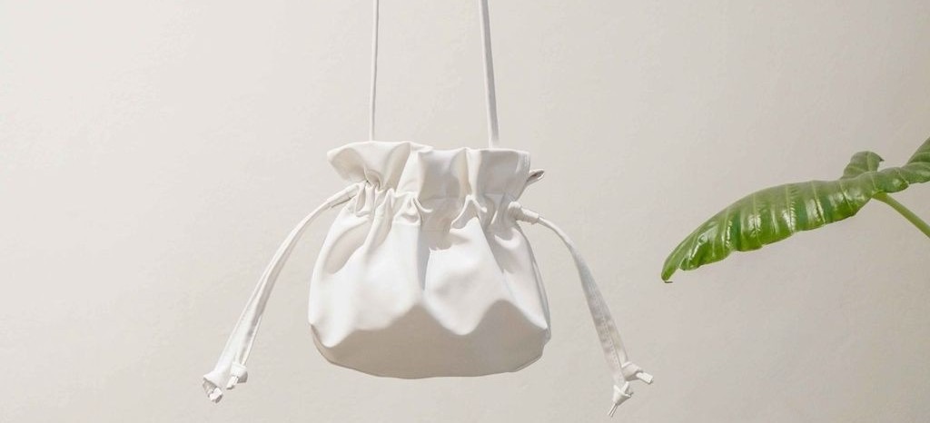 jenis bahan string bag untuk merchandise karyawan